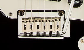 TWO-POINT SYNCHRONIZED TREMOLO WITH BLOCK SADDLES
